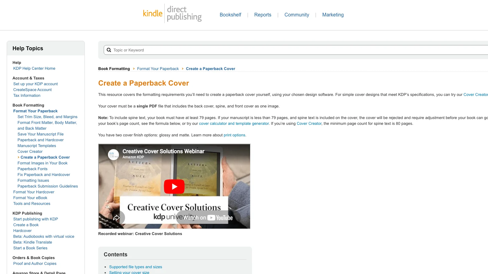 Amazon KDP help center page titled Create a Paperback Cover showing requirements that the cover must be a single PDF including back cover spine and front cover and a minimum of 79 pages for spine text