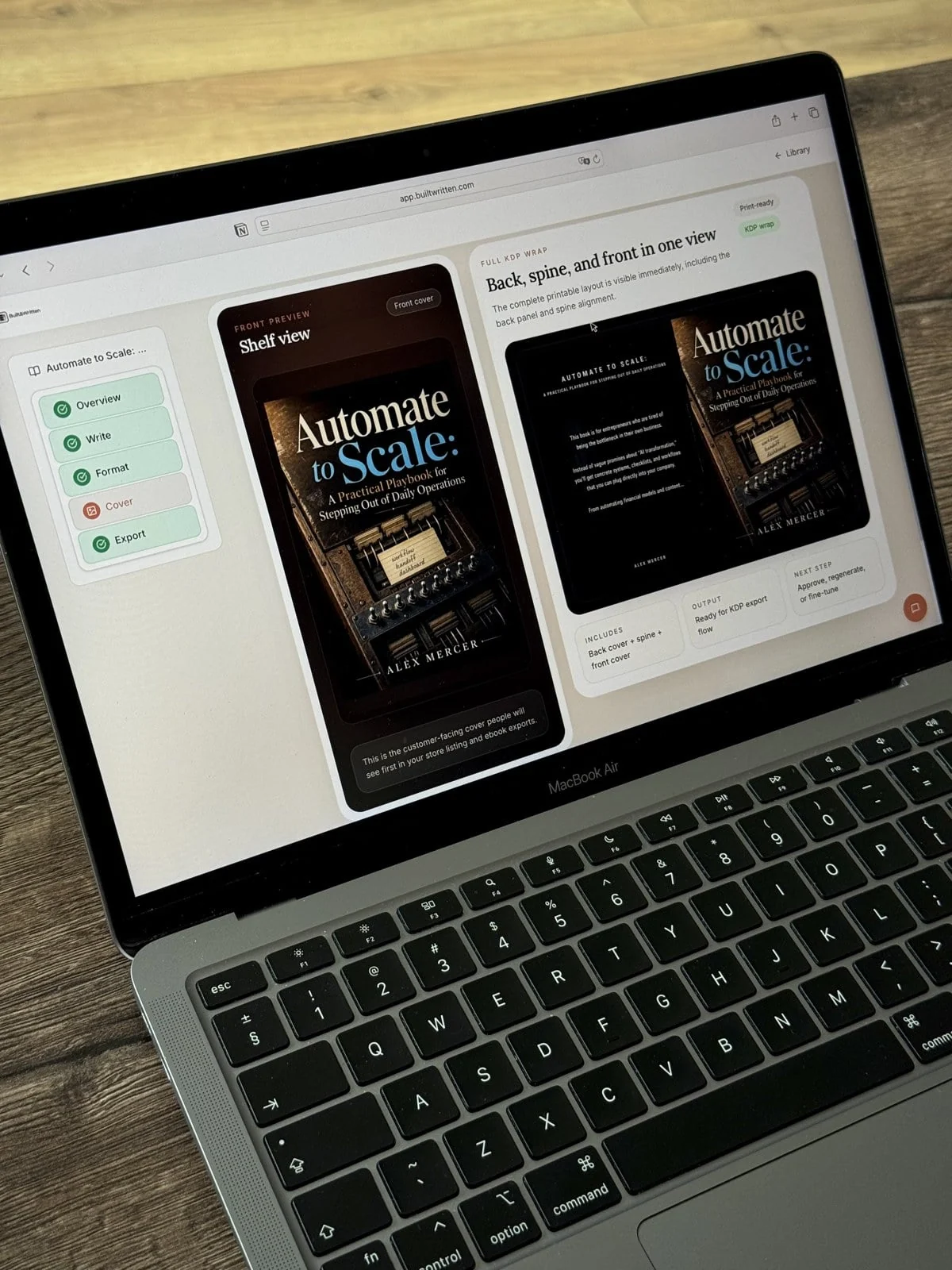 MacBook on a wooden floor displaying Built&Written book cover previews